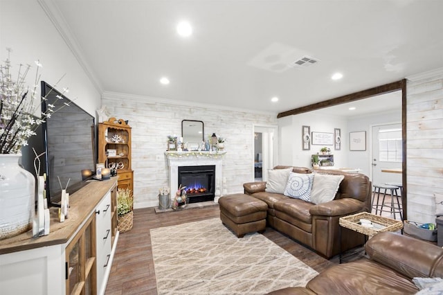 586 Del Mar Ave, Chula Vista, CA 91910 - living area featuring wood finished floors, recessed lighting, ornamental molding, and a glass covered fireplace