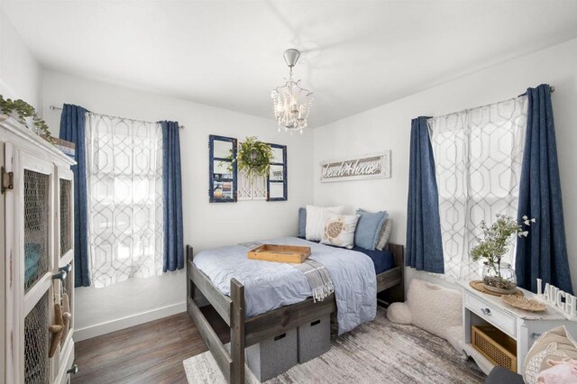 586 Del Mar Ave, Chula Vista, CA 91910 - bedroom featuring wood finished floors, a chandelier, and baseboards