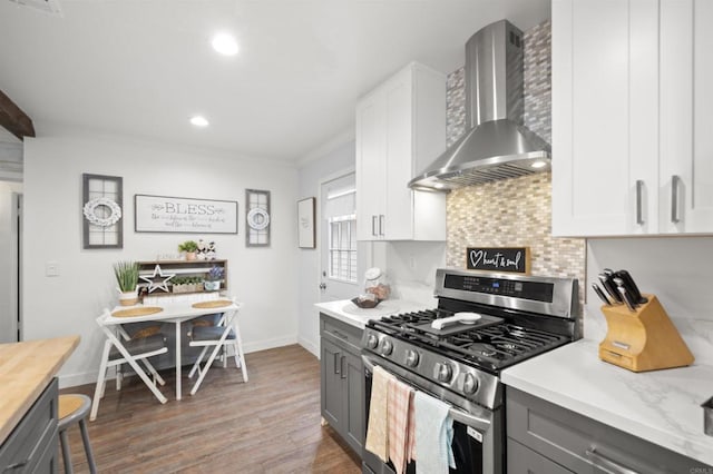 586 Del Mar Ave, Chula Vista, CA 91910 - kitchen with stainless steel range with gas cooktop, wall chimney range hood, light countertops, gray cabinets, and tasteful backsplash
