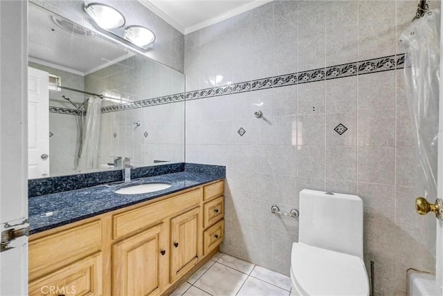 bathroom featuring toilet, tile walls, curtained shower, crown molding, and vanity