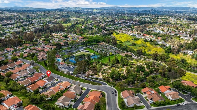 birds eye view of property with a residential view and a mountain view