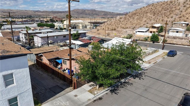 113 E White St, Barstow, CA 92311 - aerial perspective of suburban area featuring mountains