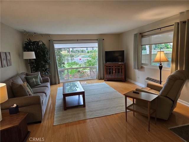 185 Avenida Majorca Unit A, Laguna Woods, CA 92637 - living room with wood finished floors and baseboards