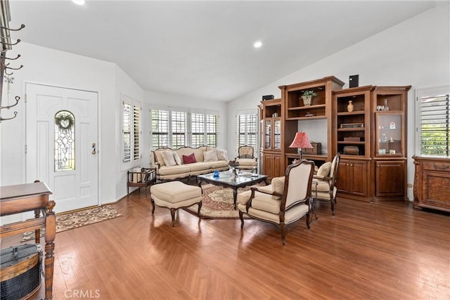 2757 Cape Dr, Corona, CA 92882 - living area featuring vaulted ceiling, wood finished floors, and recessed lighting
