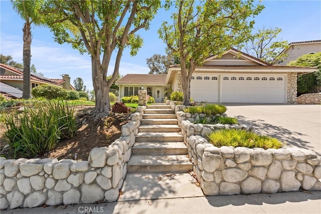 2757 Cape Dr, Corona, CA 92882 - view of front of home featuring an attached garage and concrete driveway