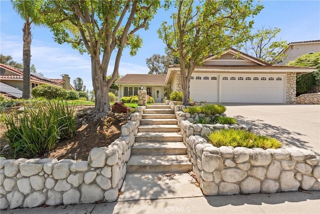 2757 Cape Dr, Corona, CA 92882 - view of front facade with a garage and concrete driveway