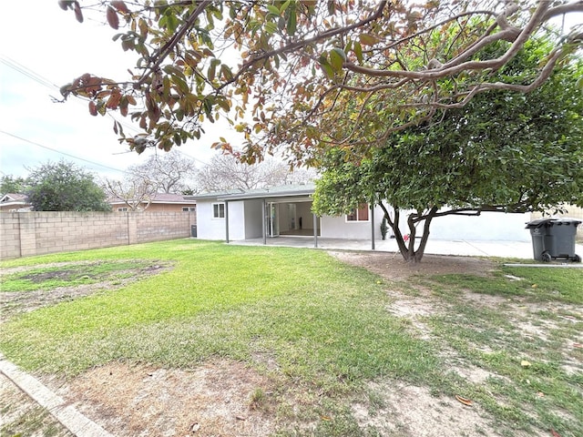 rear view of property with a patio and stucco siding