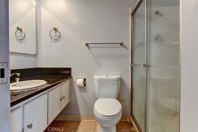 800 W 1st St Unit 710, Los Angeles, CA 90012 - bathroom featuring vanity, a stall shower, toilet, and tile patterned floors
