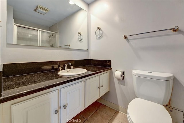 800 W 1st St Unit 710, Los Angeles, CA 90012 - full bathroom with vanity, tile patterned flooring, toilet, and a shower with shower door