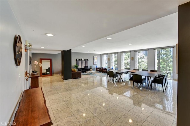 800 W 1st St Unit 710, Los Angeles, CA 90012 - dining space with recessed lighting and baseboards