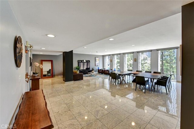 800 W 1st St Unit 710, Los Angeles, CA 90012 - dining room featuring recessed lighting and baseboards