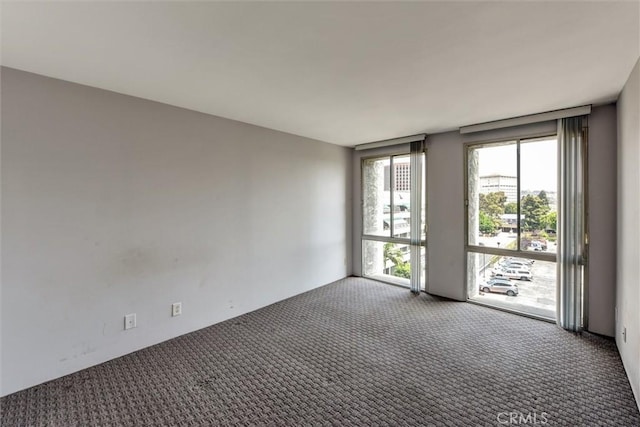 800 W 1st St Unit 710, Los Angeles, CA 90012 - unfurnished room featuring carpet floors