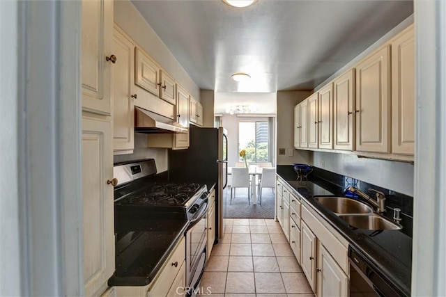 800 W 1st St Unit 710, Los Angeles, CA 90012 - kitchen with stainless steel range with gas stovetop, a sink, under cabinet range hood, dishwasher, and cream cabinetry