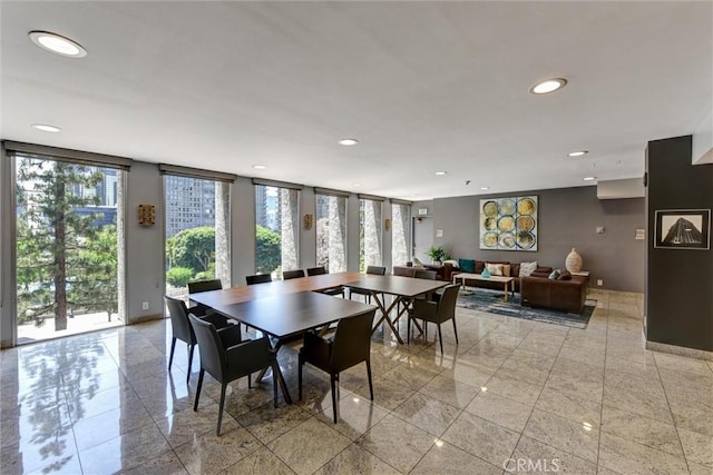 800 W 1st St Unit 710, Los Angeles, CA 90012 - dining area with recessed lighting and baseboards