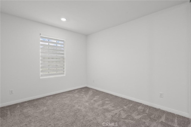 3981 E Huntington St, Ontario, CA 91761 - spare room with carpet, baseboards, and recessed lighting