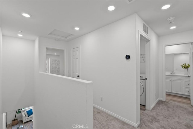 3981 E Huntington St, Ontario, CA 91761 - hallway with recessed lighting, light carpet, visible vents, and attic access