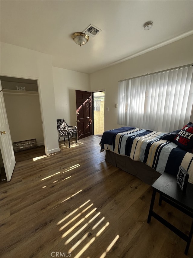 1449 W 45th St, Los Angeles, CA 90062 - bedroom with wood finished floors and baseboards