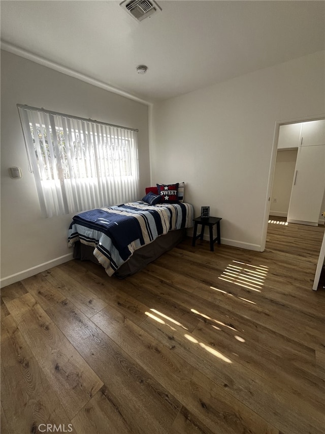 1449 W 45th St, Los Angeles, CA 90062 - bedroom featuring hardwood / wood-style floors and baseboards