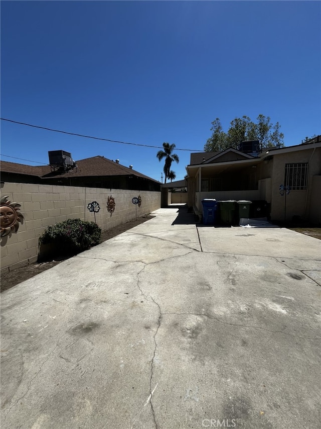 1449 W 45th St, Los Angeles, CA 90062 - view of parking featuring fence