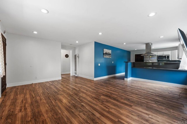1990 Harrison Ave, San Diego, CA 92113 - unfurnished living room with dark wood finished floors, baseboards, and recessed lighting