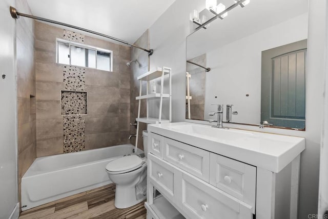 1990 Harrison Ave, San Diego, CA 92113 - bathroom featuring vanity, shower / bathtub combination, toilet, and wood finished floors