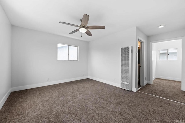1990 Harrison Ave, San Diego, CA 92113 - unfurnished bedroom with a heating unit, baseboards, and carpet floors