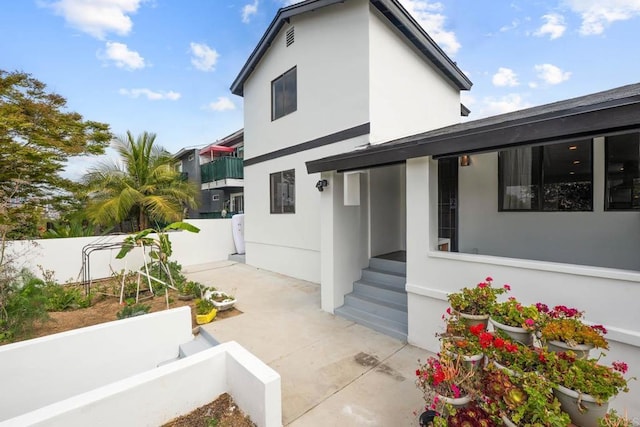1990 Harrison Ave, San Diego, CA 92113 - exterior space with a patio area, stucco siding, and fence