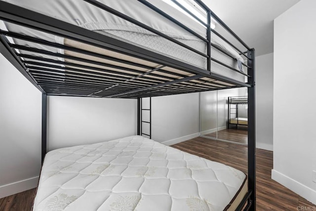 1990 Harrison Ave, San Diego, CA 92113 - unfurnished bedroom featuring baseboards and wood finished floors
