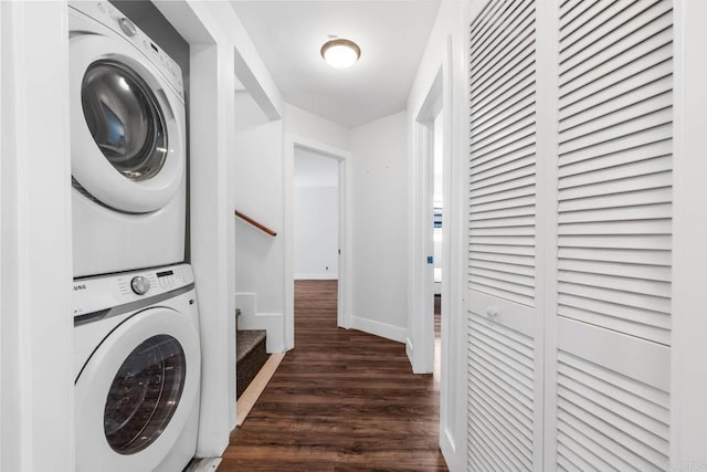 1990 Harrison Ave, San Diego, CA 92113 - laundry area featuring baseboards, dark wood-style flooring, stacked washing maching and dryer, and laundry area