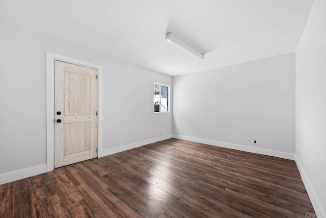 1990 Harrison Ave, San Diego, CA 92113 - spare room featuring baseboards and dark wood finished floors