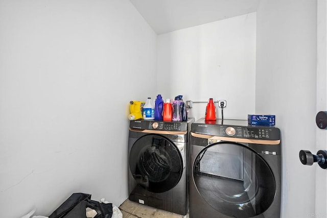 1990 Harrison Ave, San Diego, CA 92113 - washroom with washing machine and clothes dryer and laundry area