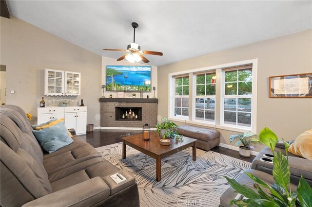 21089 Ottawa Rd, Apple Valley, CA 92308 - living room with a brick fireplace, wood finished floors, baseboards, and ceiling fan