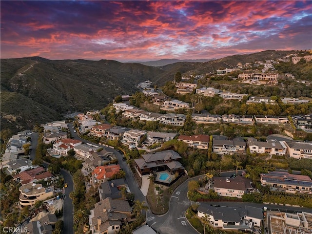 aerial view featuring a mountain view and a residential view