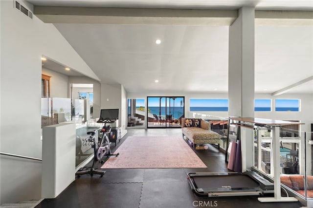 workout room with visible vents and lofted ceiling