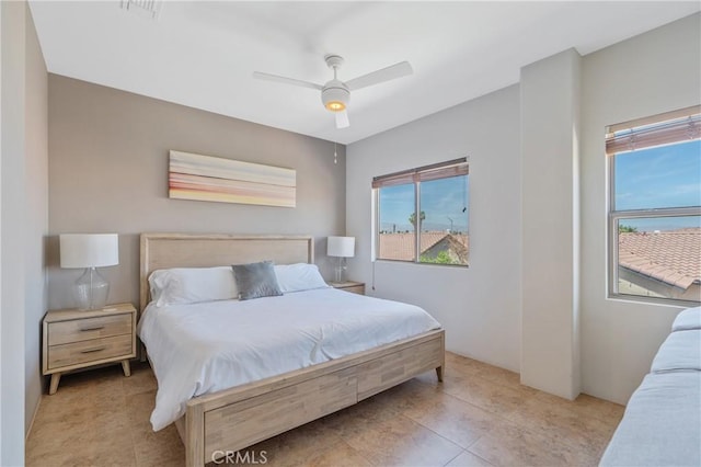 48674 Acropolis St, Indio, CA 92201 - bedroom with multiple windows and a ceiling fan