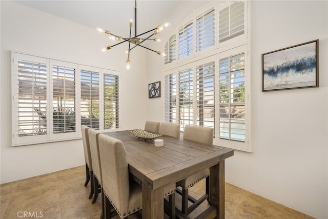 48674 Acropolis St, Indio, CA 92201 - dining area with a chandelier and a high ceiling