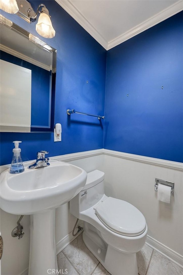 15723 La Belle St, Hacienda Heights, CA 91745 - half bathroom with toilet, wainscoting, crown molding, and a sink