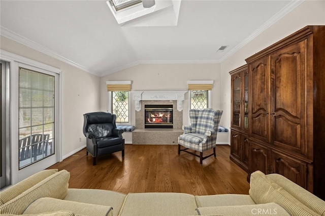 15723 La Belle St, Hacienda Heights, CA 91745 - living area with plenty of natural light, wood finished floors, lofted ceiling with skylight, and a high end fireplace
