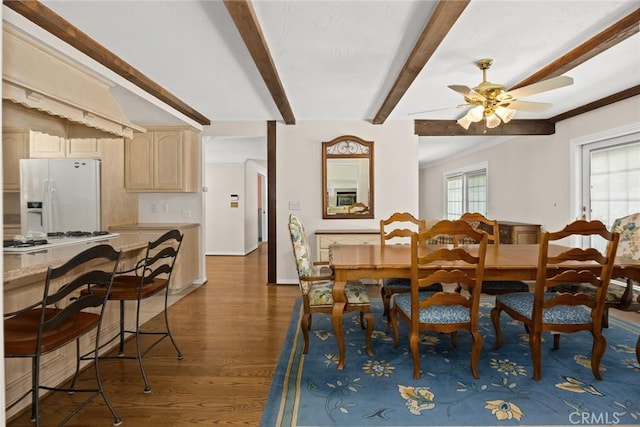 15723 La Belle St, Hacienda Heights, CA 91745 - dining space featuring dark wood-style flooring, a ceiling fan, plenty of natural light, and beam ceiling