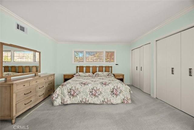 15723 La Belle St, Hacienda Heights, CA 91745 - bedroom featuring multiple windows, crown molding, two closets, visible vents, and light colored carpet