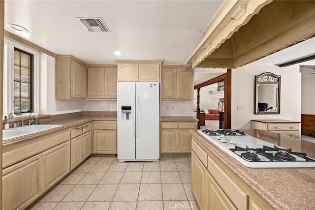 15723 La Belle St, Hacienda Heights, CA 91745 - kitchen with white appliances, light brown cabinetry, visible vents, and a sink