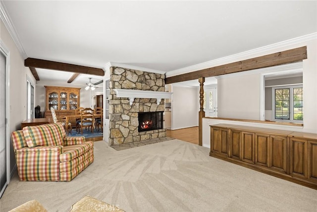 15723 La Belle St, Hacienda Heights, CA 91745 - carpeted living area with ornamental molding, beam ceiling, a fireplace, and ceiling fan
