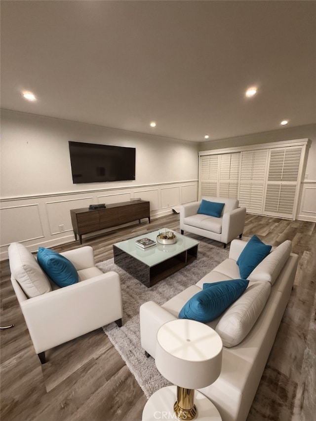 22723 Maple Ave, Torrance, CA 90505 - living area featuring wood finished floors, a decorative wall, wainscoting, and recessed lighting