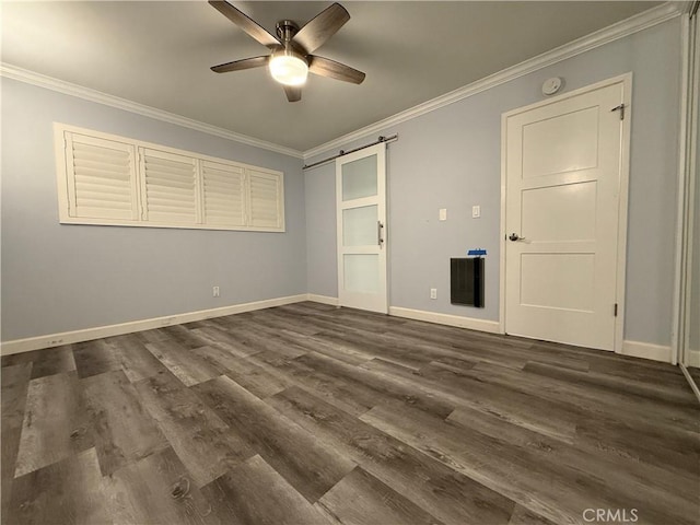 22723 Maple Ave, Torrance, CA 90505 - unfurnished bedroom with crown molding, dark wood-type flooring, a barn door, and ceiling fan