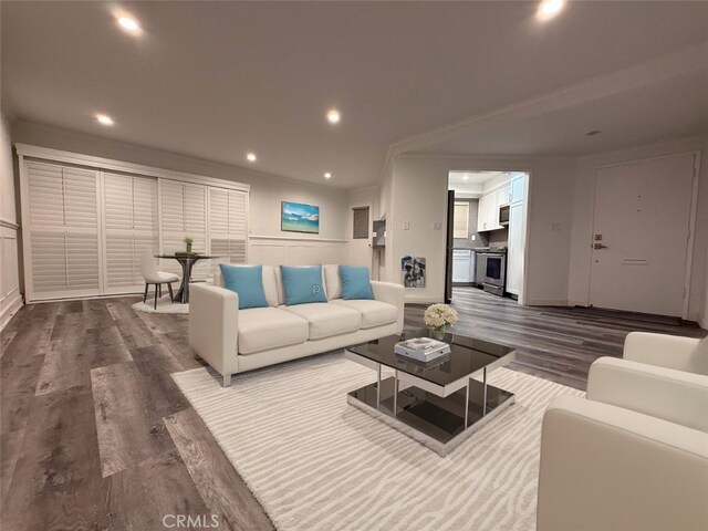 22723 Maple Ave, Torrance, CA 90505 - living area with dark wood-style flooring, recessed lighting, and crown molding