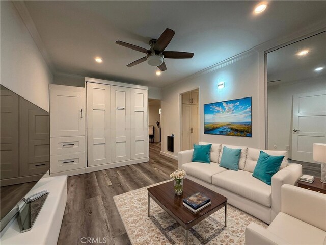 22723 Maple Ave, Torrance, CA 90505 - living area with ornamental molding, ceiling fan, recessed lighting, and dark wood finished floors