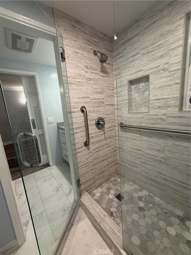 22723 Maple Ave, Torrance, CA 90505 - bathroom featuring a stall shower, marble finish floors, and vanity