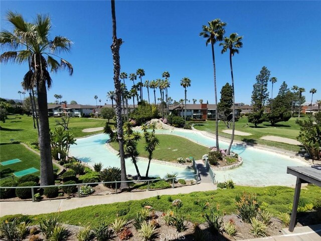 surrounding community featuring a yard