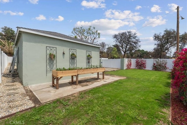 view of outdoor structure featuring a fenced backyard