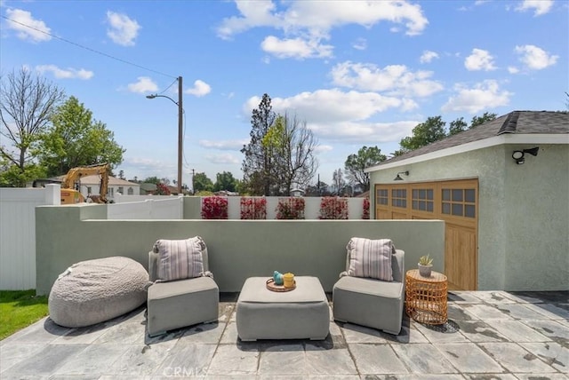 view of patio / terrace with fence
